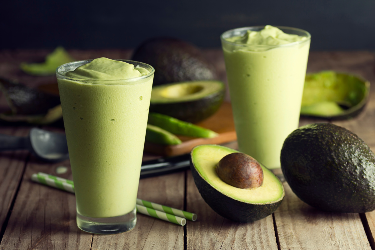 Two Avocado Shakes or Smoothies with Ingredients